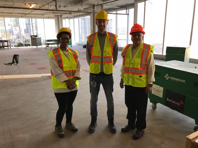 Site visit with construction team — Deven committed to community infrastructure